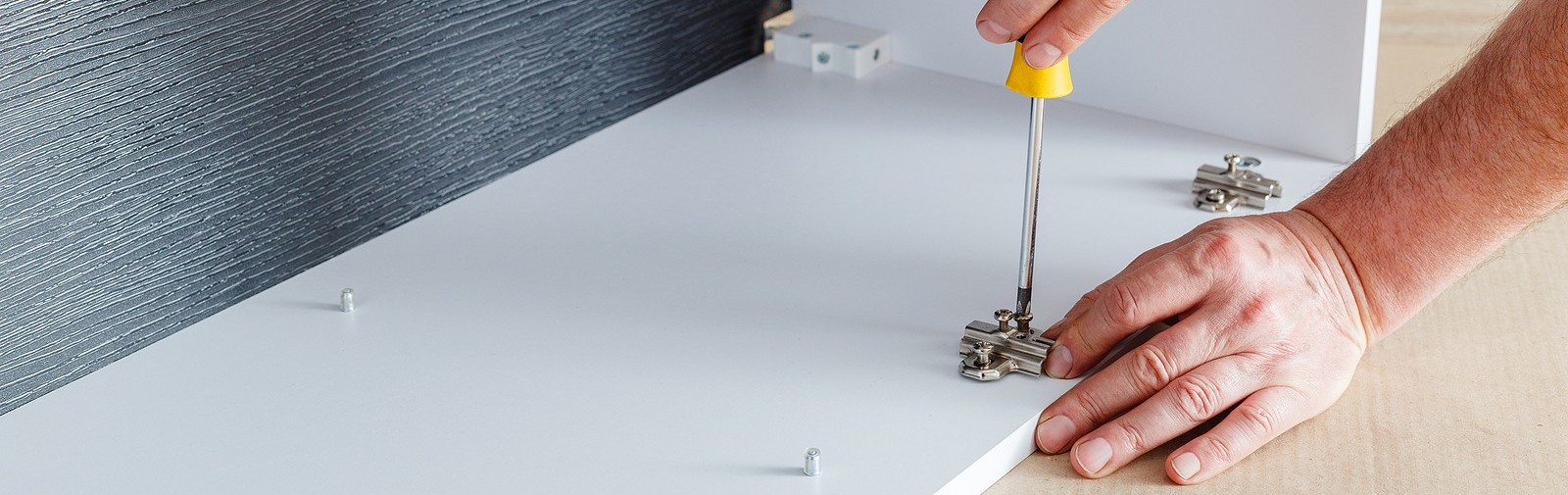 bigstock-Joiner-Collects-Furniture-Usin-385385540.jpg
